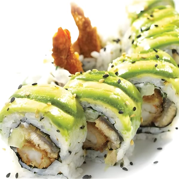 Asuka Japanese Cuisine's sushi roll with avocado, tempura shrimp, and black and white sesame seeds.