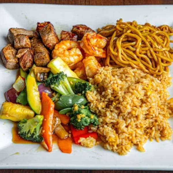 Asuka Japanese Cuisine's hibachi meal with steak, shrimp, noodles, fried rice, and mixed vegetables.